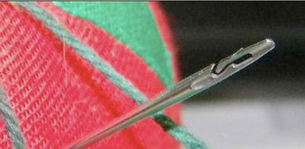 Needle with a hole that does not require perfect vision and fine motor skills